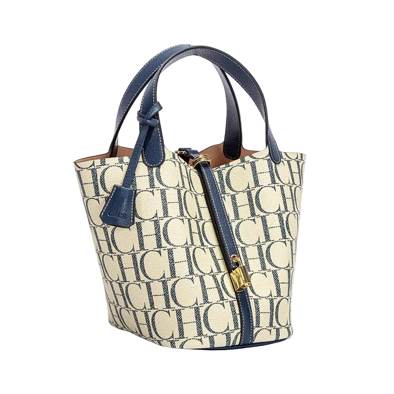 Handbag with monogram pattern and blue accents on a white background