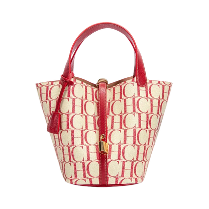 Handbag with red handle and 'CHC' pattern