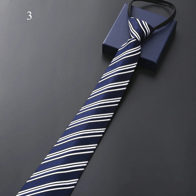 Navy and white striped tie on a dark gray background