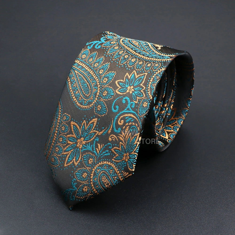 Patterned tie with blue and gold design on a black background