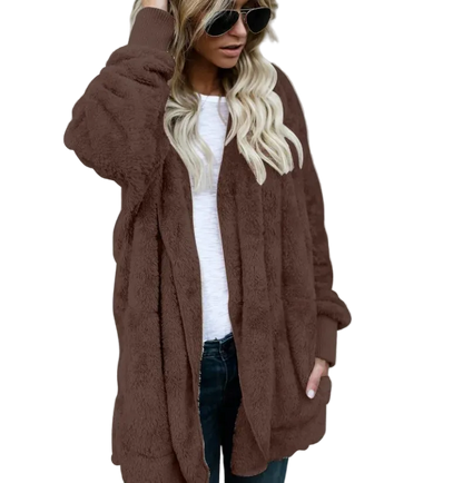 Woman wearing a brown cardigan over a white shirt